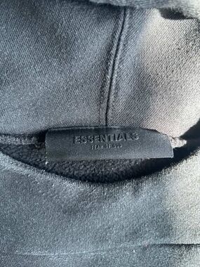 Essentials Black Pullover Hoodie with Embossed Label